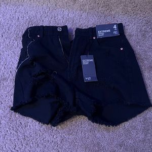 Black ripped denim shorts